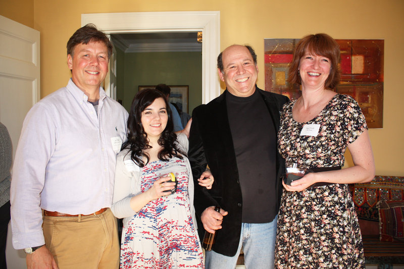 John Williams, executive director of 317 Main Street Community Music Center, bar manager Brittan Pistole, board member Jon Cooper and office manager Fiona O'Grady.