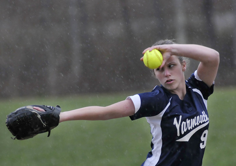 McKenzie Gray of Yarmouth ignores the raindrops to allow six hits Thursday, winning a duel with Leigh Wyman of Freeport. Gray induced two double plays.