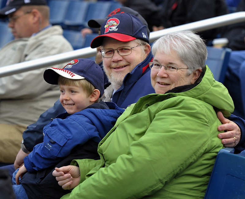 Bill and Liz Burgess of Augusta, pictured here in the Hadlock Field stands on April 12, 2012, have attended 19 Portland Sea Dogs Opening Day games. Their grandson, Devin Tardif, who is 4 years old, has attended five Opening Day games. 