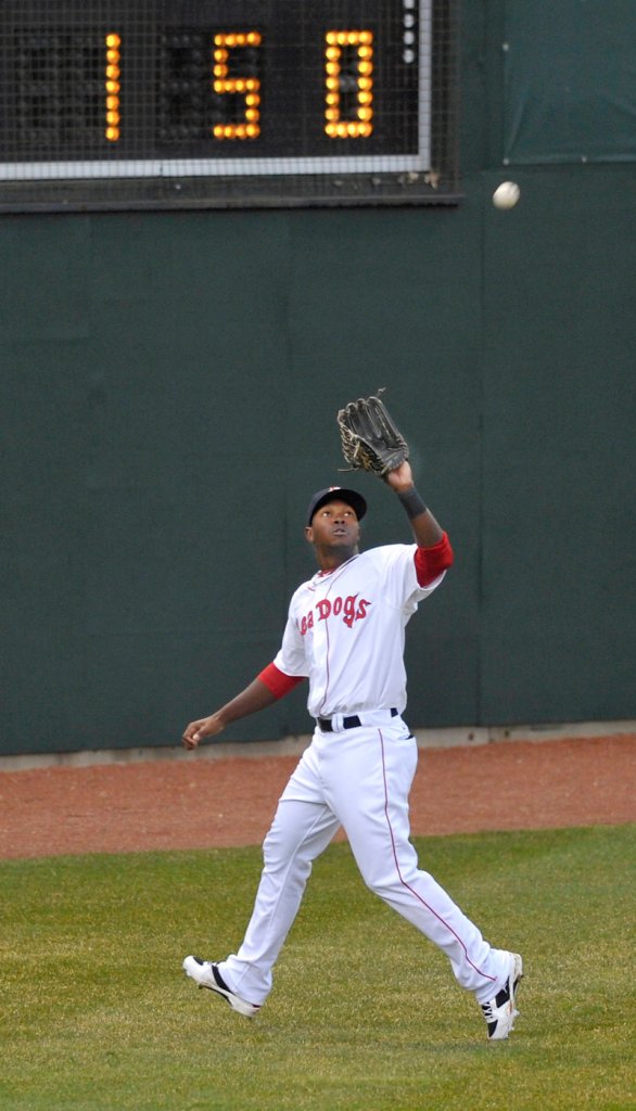 Center fielder Juan Carlos Linares approaches the warning track to haul in a fly ball. Linares homered to lead off the first inning – the only run for the Sea Dogs.