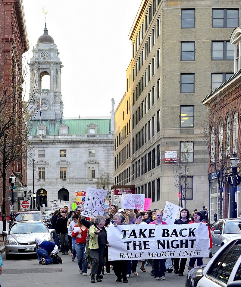 Marchers participate in the 2010 Take Back the Night rally on Exchange Street in Portland. This year’s march is April 27.