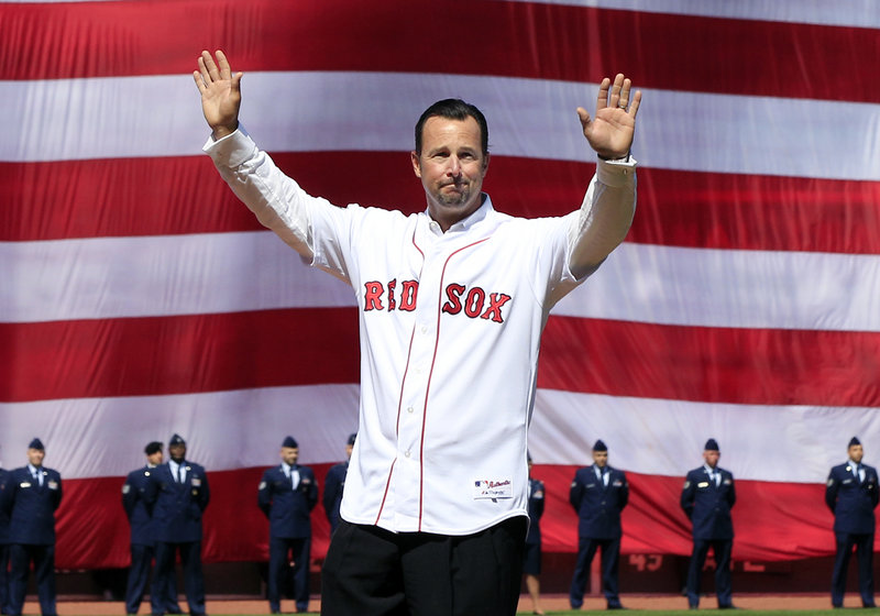 Tim Wakefield was part of the opening ceremonies Friday at Fenway Park, as was Jason Varitek. The two recently retired players returned to Fenway to throw out the first pitch before the 12-2 victory over Tampa Bay.
