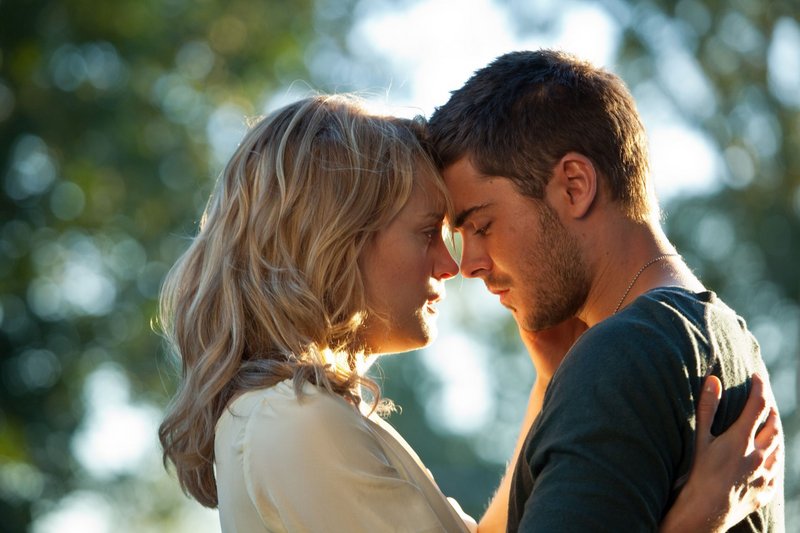 Taylor Schilling and Zac Efron turn up the heat in “The Lucky One.”