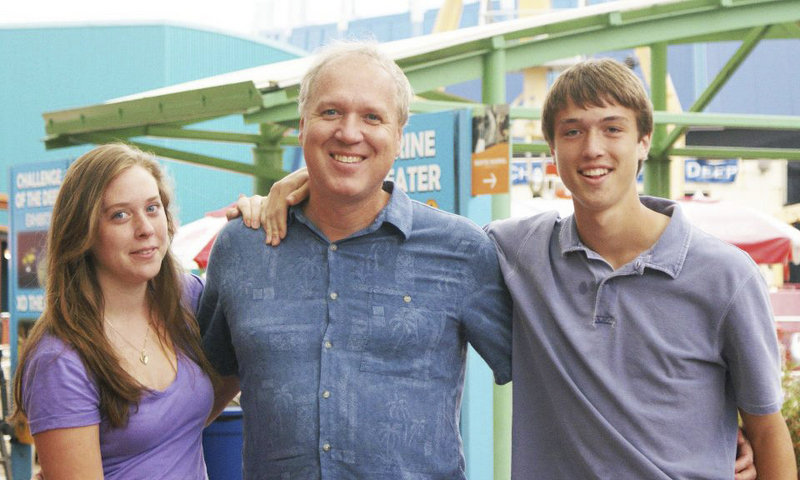 Steven Langlais poses with his children in 2009, Emma, left, who is now 18 and a senior at Maine School of Science and Mathematics in Limestone, and Sam, 19, who attends Wentworth Institute of Technology in Boston.