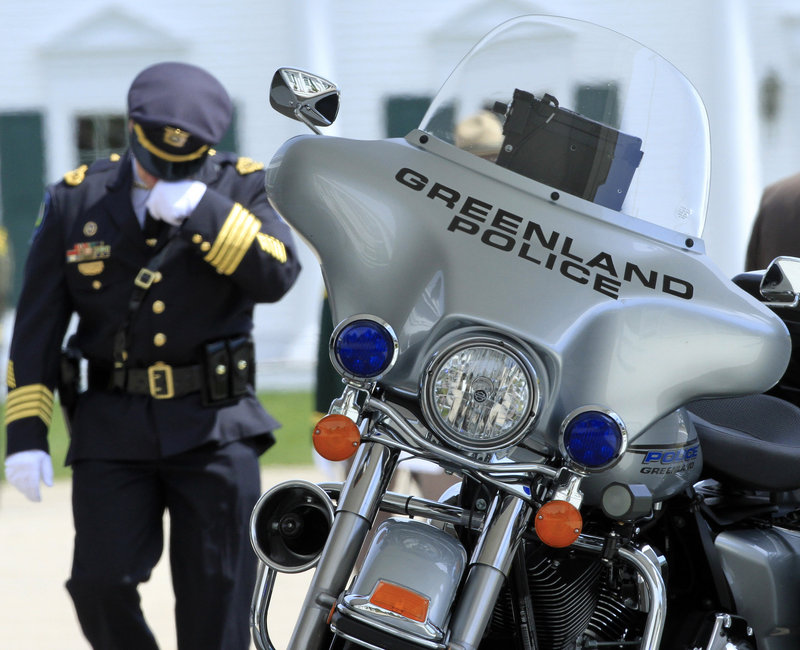 Maloney’s motorcycle was displayed outside the funeral home where a wake was held.