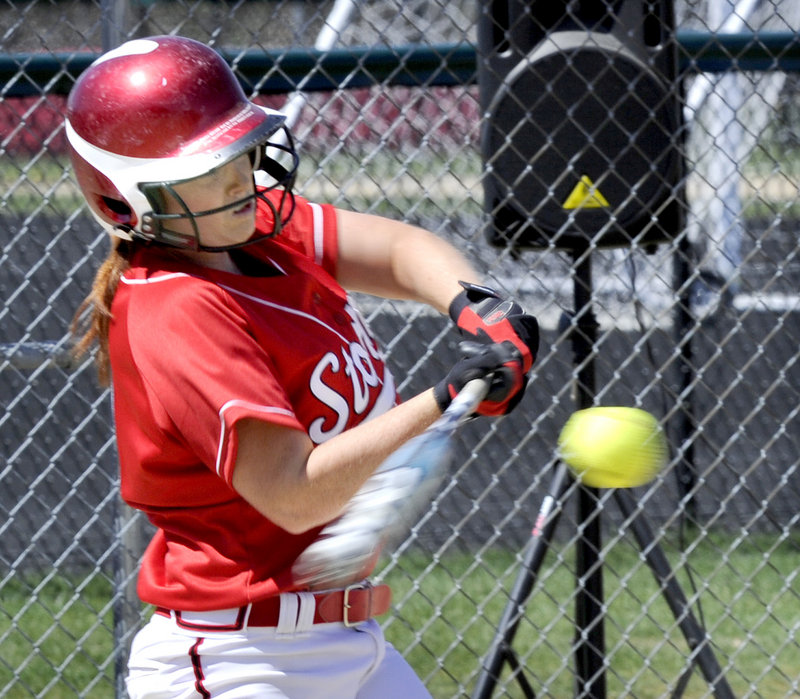 Mo Hannan connects for a three-run homer that helped Scarborough finish off a 13-0 victory over Biddeford in a softball season opener Thursday.