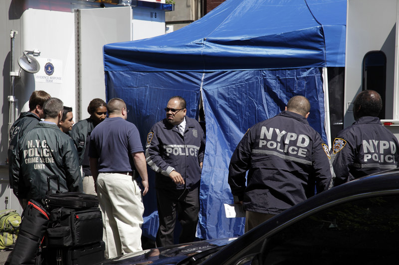 FBI agents and police search a SoHo basement for the remains of Etan Patz on Thursday. Etan vanished in 1979 after leaving home for a short walk to his school bus stop.