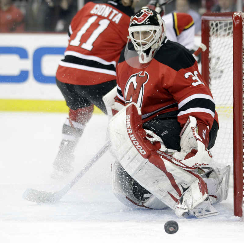 Martin Brodeur keeps his eyes on the puck during his 26-save effort as the Devils beat the Panthers 4-0 to tie their playoff series 2-2. It was Brodeur’s 24th playoff shutout.