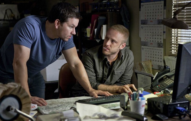 Mark Wahlberg, left, and Ben Foster in “Contraband.”