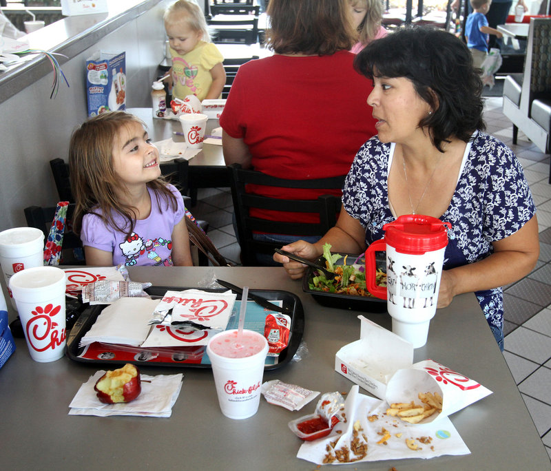 Orlando mom Cindy Metzger dines out at a Chick-Fil-A restaurant with 6-year-old daughter Ava who, Metzger said, “all of a sudden one day wanted to have the numbered meals” instead of kids’ meals.