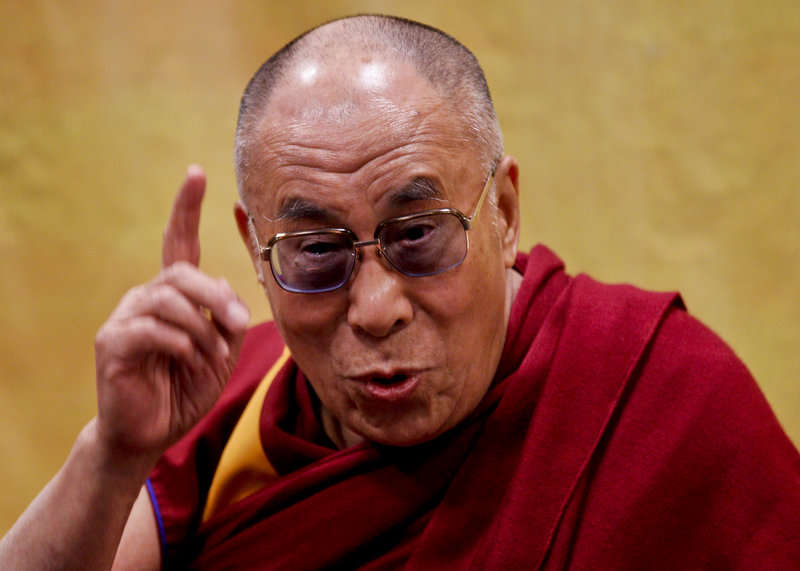 Tenzin Gyatso, the 14th Dalai Lama, was joined on stage at Loyola University Thursday by three teenagers who read their essays on nonviolence. The Dalai Lama, responding to one of their questions, said he wished he’d known at age 17 that “knowledge which we gain with enthusiasm ... tends to last longer and go deeper.”