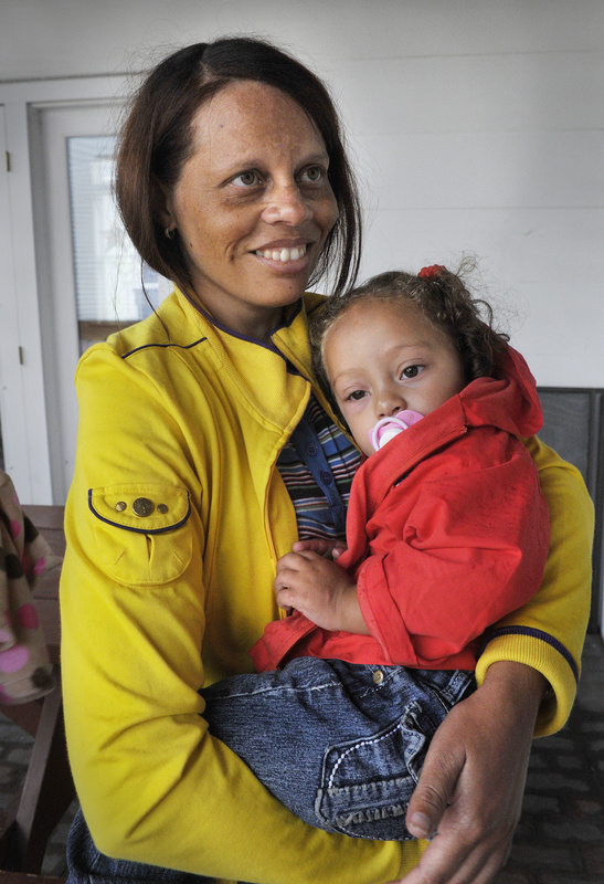 Dolores Mayi holds 21-month-old Daisy, one of two girls from the Dominican Republic who arrived in Portland on Tuesday to undergo open-heart surgery at Maine Medical Center. Arrangements for the surgeries were made through a Rotary program.