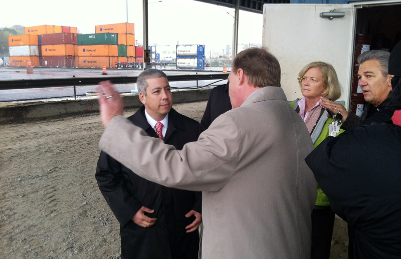 David Matsuda, left, who heads the the U.S. Maritime Administration, learns about infrastructure improvements being made at the International Marine Terminal from John Henshaw, executive director of the Maine Port Authority, and U.S. Rep. Chellie Pingree, D-1st District. Matsuda visited Portland and other Maine ports today. Jack Humeniuk, business agent for the International Longshoremen's Association Local 861, talks with Pingree in back.
