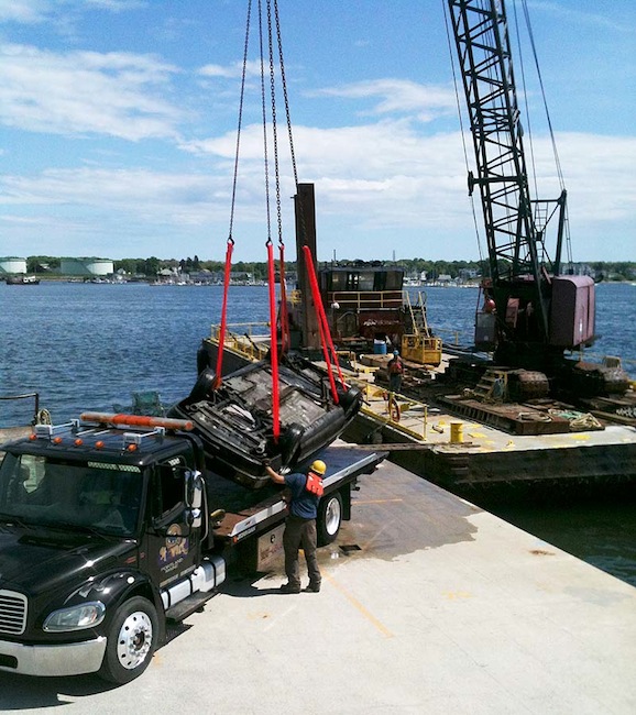 A car discovered in Portland Harbor by divers searching for missing Harvard student Nathan Bihlmaier is recovered on Wednesday, May 23, 2012.
