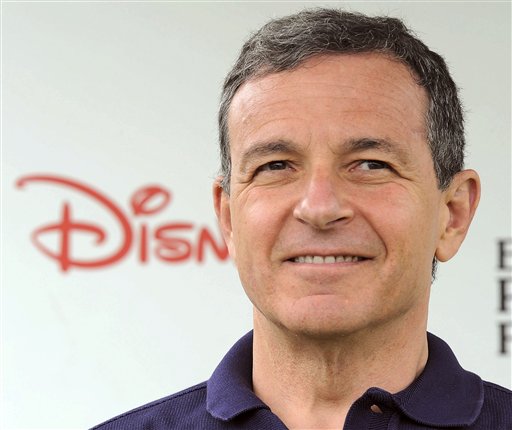 FILE - In this June 12, 2011 file photo, Robert Iger srrives at The 22nd Annual A Time for Heroes Celebrity Carnival Sponsored by Disney at Wadsworth Theater in Los Angeles. Iger is one of the top 10 highest paid CEOs at publicly held companies in America last year, according to calculations by Equilar, an executive compensation data firm, and The Associated Press. The Associated Press formula calculates an executive's total compensation during the last fiscal year by adding salary, bonuses, perks, above-market interest the company pays on deferred compensation and the estimated value of stock and stock options awarded during the year. (AP Photo/Katy Winn, File)