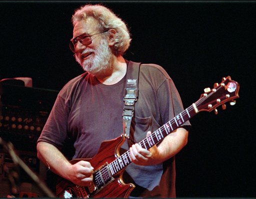 FILE - In this Nov. 1, 1992 file photo, Grateful Dead lead singer Jerry Garcia performs at the Oakland, Calif., Coliseum. The Grateful Dead's famous 1977 Barton Hall concert is joining Donna Summer's hit "I Feel Love" as sounds of cultural significance, among 25 additions that are being announced Wednesday, May 23, 2012 by the Library of Congress as part of its National Recording Registry. (AP Photo/Kristy McDonald, File)