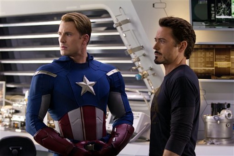 In this film image released by Disney, Chris Evans, portraying Captain America, left, and Robert Downey Jr., portraying Tony Stark, are shown in a scene from "Marvel's The Avengers" (AP Photo/Disney, Zade Rosethal)
