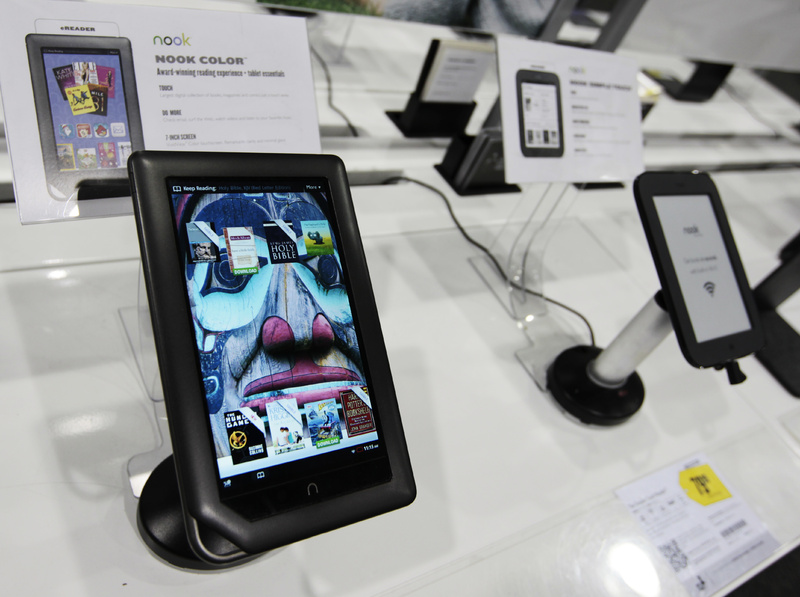 A Barnes & Noble Nook, left, is shown next to a Nook Simple Touch, right, on display at a Best Buy in Mountain View, Calif.