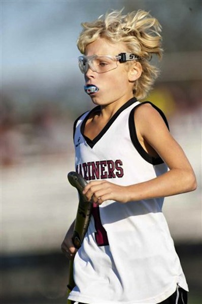 In an Oct. 21, 2011 photo, Keeling Pilaro, 13, is seen on the field as a member of the Southhampton High School Girls' Varsity field hockey team during a game against Miller Place, in Southhampton, N.Y. (AP Photo/Newsday, Gordon M. Grant)