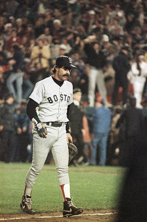 Boston Red Sox first baseman Bill Buckner is a picture of dejection as he leaves the field on Oct. 25, 1986, after committing an error on a ball hit by New York Mets' Mookie Wilson, which allowed the winning run to score in the sixth game of the World Series, in New York.