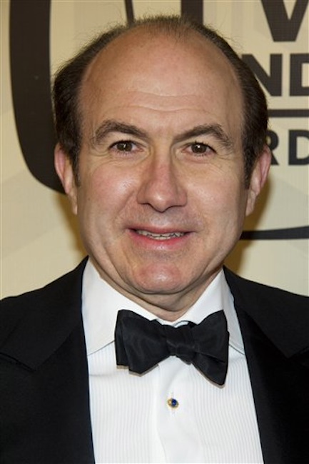 In this April 14, 2012 file photo, Viacom CEO Philippe Dauman arrives to the TV Land Awards 10th Anniversary in New York. Dauman is one of the top 10 highest paid CEOs at publicly held companies in America last year, according to calculations by Equilar, an executive compensation data firm, and The Associated Press. The Associated Press formula calculates an executive's total compensation during the last fiscal year by adding salary, bonuses, perks, above-market interest the company pays on deferred compensation and the estimated value of stock and stock options awarded during the year.(AP Photo/Charles Sykes, File) Award ceremony keytest012 Red carpet One person