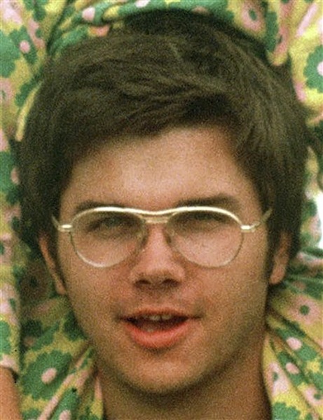 In this 1975 file photo, Mark David Chapman is seen at Fort Chaffee near Fort Smith, Ark. The Buffalo News reports that 57-year-old Mark David Chapman was transferred Tuesday, May 15, 2012 from Attica Correctional Facility to the nearby maximum security Wende Correctional Facility. A spokesman for the state prison system says the agency doesn't disclose why inmates are transferred. Chapman shot Lennon in December 1980 outside the Manhattan apartment building where the former Beatle lived. Chapman pleaded guilty to second-degree murder and was sentenced in 1981 to 20 years to life in prison. (AP Photo/Greg Lyuan, File)
