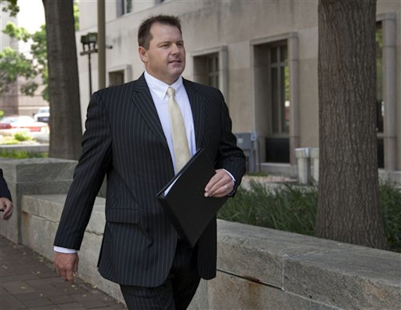 Former Major League Baseball pitcher Roger Clemens arrives at federal court in Washington, Tuesday, May 8, 2012, for his trial on charges of lying to Congress. (AP Photo/Evan Vucci)