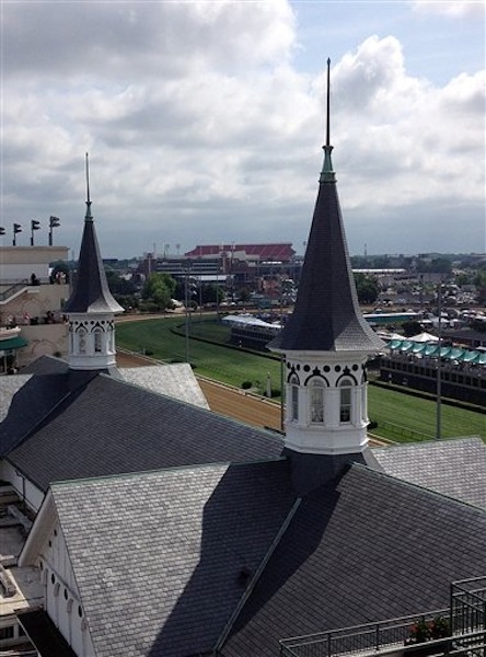 In this Saturday, May 5, 2012 photo, the twin spires at Churchill Downs are seen in Louisville, Ky. Investigators are trying to uncover clues in the mysterious death of a track worker whose body was found, Sunday, May 6, 2012, in a horse stable at Churchill Downs just a matter of hours after I'll Have Another was crowned champion of the Kentucky Derby. (AP Photo/Janet Cappiello)