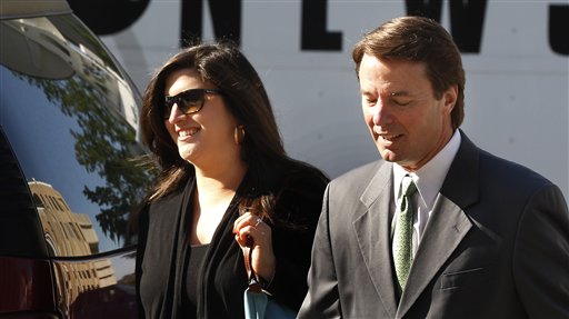 Former Senator and presidential candidate John Edwards and his daughter Cate Edwards enter the Federal Courthouse in Greensboro, N.C. on Thursday.