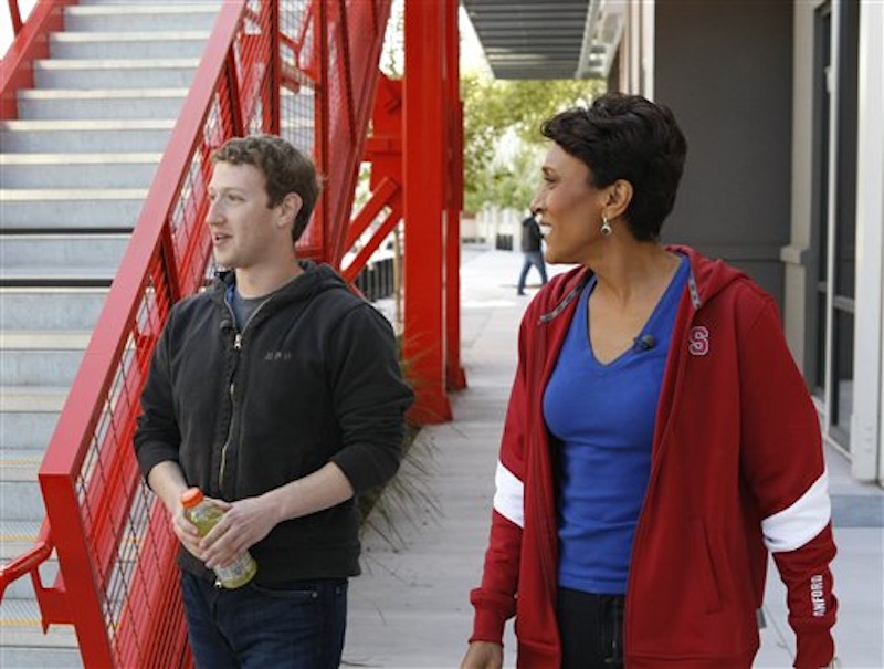 In this April 26, 2012 image released by ABC, Robin Roberts, host of "Good Morning America," right, talks to Mark Zuckerberg, the founder and CEO of Facebook, during an interview in Menlo Park, Calif., airing Tuesday, May 1, on "Good Morning America." Zuckerberg says U.S. and U.K. users will be able to enroll as organ donors via links on the world's biggest social networking site. Zuckerberg says his friendship with Apple Inc. co-founder Steve Jobs, who had received a liver transplant before he died last year, helped spur the idea. (AP Photo/ABC, Rick Rowell) GM12