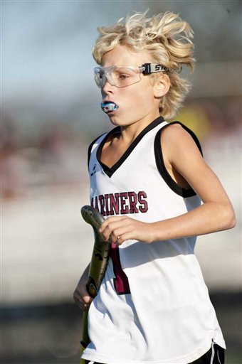 In an Oct. 21, 2011, photo, Keeling Pilaro, 13, is seen on the field as a member of the Southhampton High School Girls Varsity field hockey team in Southhampton, N.Y.