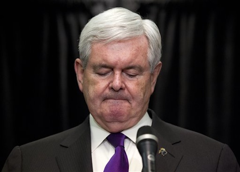 Republican presidential candidate, former House Speaker Newt Gingrich pauses while announcing that he is ending his presidential campaign, Wednesday, May 2, 2012, in Arlington, Va. (AP Photo/Evan Vucci)