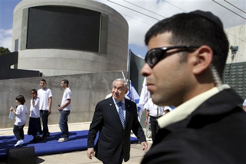 Israeli Prime Minister Benjamin Netanyahu arrives for a special cabinet meeting marking 'Jerusalem Day' in the Ammunition Hill memorial in Jerusalem, Sunday, May 20, 2012. 'Jeruslem Day' marks the anniversary of Israel's capture of the eastern part of the city in the 1967 Mideast war. (AP Photo/Abir Sultan, Pool)
