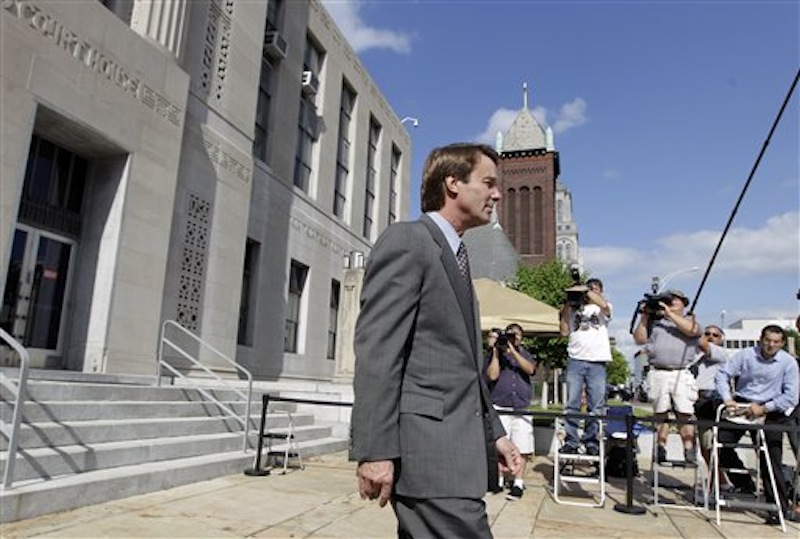 Former presidential candidate and Sen. John Edwards leaves a federal courthouse in Greensboro, N.C., Monday, May 7, 2012. Edwards is accused of conspiring to secretly obtain more than $900,000 from two wealthy supporters to hide his extramarital affair with Rielle Hunter and her pregnancy. He has pleaded not guilty to six charges related to violations of campaign-finance laws. (AP Photo/Chuck Burton)