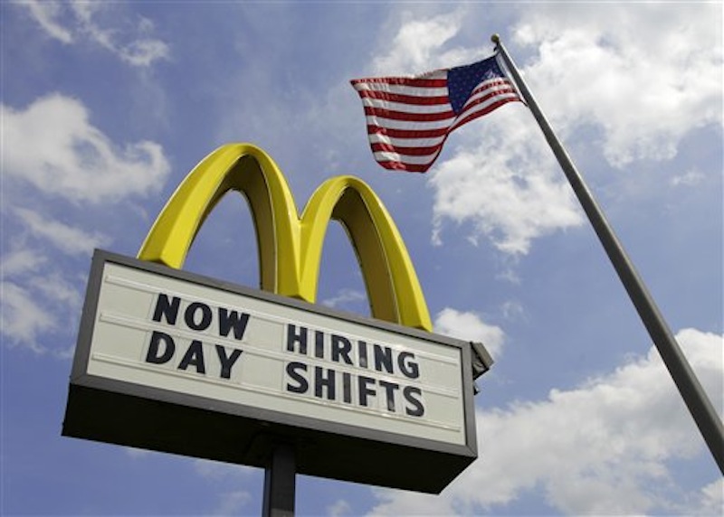 This May 2, 2012, file photo shows a sign advertising job openings outside a McDonalds restaurant in Chesterland, Ohio. The Labor Department said Tuesday, May 8, that U.S. companies in March posted the highest number of job openings in nearly four years, a sign that hiring could strengthen in the coming months after slowing this spring. (AP Photo/Amy Sancetta, File)