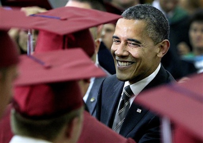 President Barack Obama greets students before the Joplin High School commencement, a day before the anniversary of the twister that killed 161 people, Monday, May 21, 2012, in Joplin, Mo. Obama jetted to Joplin to deliver the commencement address immediately after wrapping up the national security-focused NATO conference in Chicago, the second international summit the president hosted over the past four days. (AP Photo/The Kansas City Star, Rich Sugg, Pool)