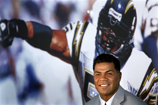 In this Aug. 14, 2006, file photo, former Patriots linebacker Junior Seau appears at a news conference announcing his retirement from football.