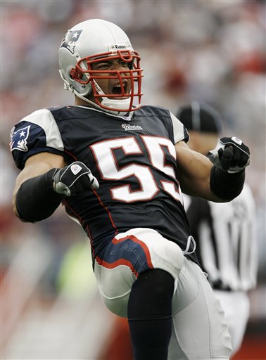In this In the Oct. 7, 2007, photo, New England Patriots linebacker Junior Seau reacts after the first of his two interceptions against the Cleveland Browns in a football game at Gillette Stadium in Foxborough, Mass.
