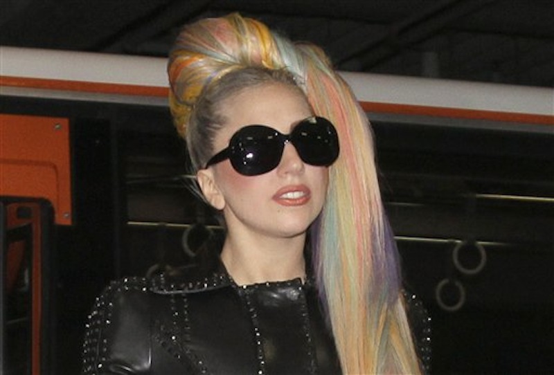 In this photo taken on Tuesday, May 8, 2012, Lady Gaga arrives at Narita International Airport in Narita, east of Tokyo. Lady Gaga has to cancel her sold-out show in Indonesia because Islamic hard-liners and conservative lawmakers objected. National police spokesman Boy Rafli Amar said the permit was denied for the June 3, 2012, "Born This Way" concert that was to be the biggest show on her Asian tour. (AP Photo/Shizuo Kambayashi)
