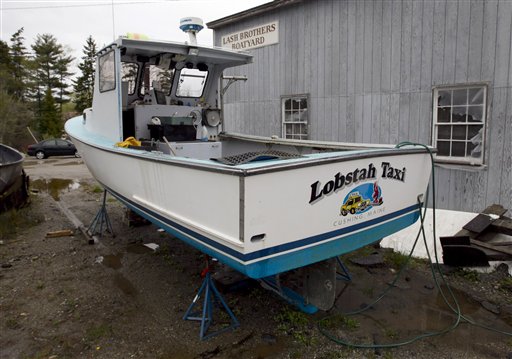 One of the two lobster boats recently sunk by vandals is seen in a boatyard in Friendship.