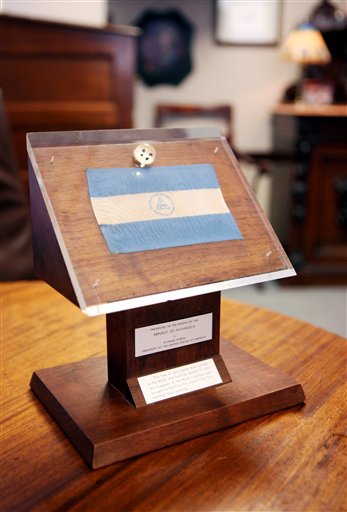 A plaque containing moon rocks and a small Nicaraguan flag are shown at the office of lawyer Richard Wright Friday, May 18, 2012, in Las Vegas. The plaque and moon rocks were originally presented as a gift to the people of Nicaragua by President Nixon. (AP Photo/Las Vegas Review-Journal, Ronda Churchill)