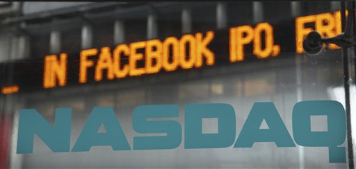 News about the Facebook IPO passes on a billboard outside of NASDAQ in Times Square, New York on Tuesday.