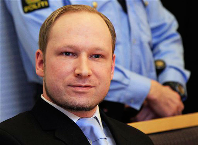 In this Feb. 6, 2012 photo, Anders Behring Breivik, a right-wing extremist who confessed to a bombing and mass shooting that killed 77 people on July 22, 2011, arrives for a detention hearing at a court in Oslo, Norway. (AP Photo/Lise Aserud, Scanpix Norway)