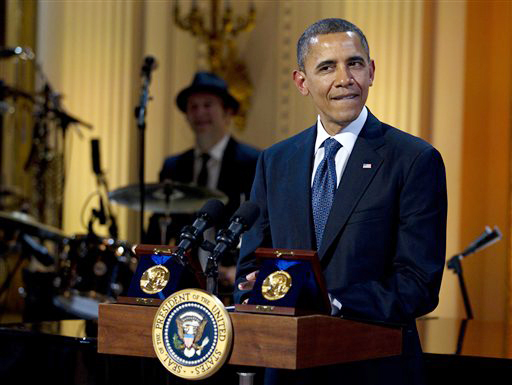 President Barack Obama pauses as he speaks during the "In Performance at the White House" on Wednesday, honoring songwriters Burt Bacharach and Hal David, recipients of the 2012 Library of Congress Gershwin Prize for Popular Song.