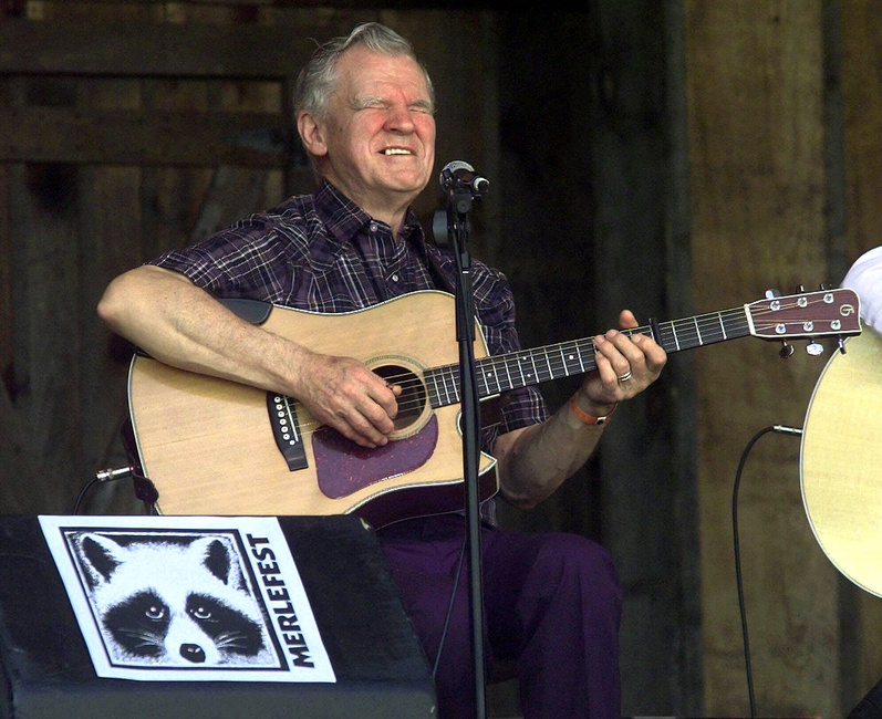 Master flatpicker Doc Watson performs at the annual Merlefest at Wilkes Comunity College in Wilkesboro, N.C., in 2001. Watson died today at a hospital in Winston-Salem.