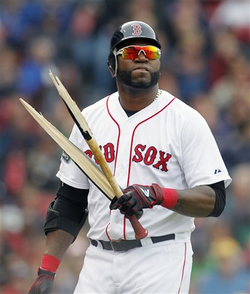 Boston Red Sox's David Ortiz walks back to the dug out with a broken bat after lining out in the eighth inning of a baseball game against the Baltimore Orioles in Boston, Saturday, May 5, 2012. (AP Photo/Michael Dwyer)