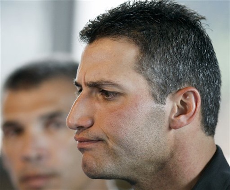In this Feb. 18, 2008 file photo, then-New York Yankees' baseball pitcher Andy Pettitte answers questions during a news conference in Tampa, Fla. about Roger Clemens alleged steroid use. (AP Photo/Julie Jacobson, File)