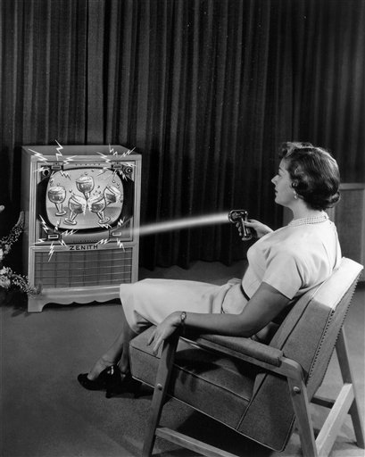 This 1955 photo illustration provided by LG Electronics, shows an ad for a Zenith "Flash-Matic," the first wireless TV remote control. A spokesman for Zenith Electronics says engineer Eugene Polley, the inventor of the device, died May 20, 2012, of natural causes in Downers Grove, Ill. He was 96. Polley and fellow Zenith engineer Robert Adler were honored in 1997 with Emmys for their work in pioneering TV remotes. (AP Photo/LG Electronics)