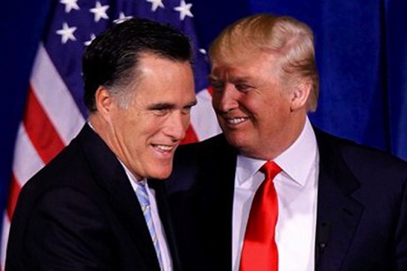 Republican presidential candidate Mitt Romney and Donald Trump smile together at a press conference. Trump and Romney will fundraise together this week in Las Vegas.