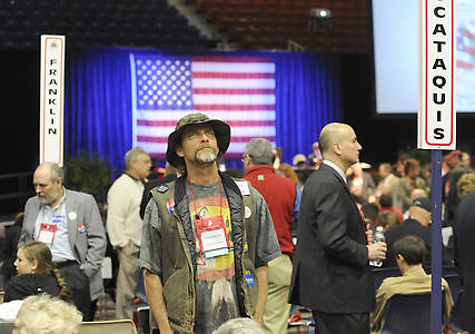 Delegate Frederick Divittorio from Blanchard, Maine, checks out the crowd at the GOP State Convention at the Augusta Civic Center on Saturday, May 5, 2012.